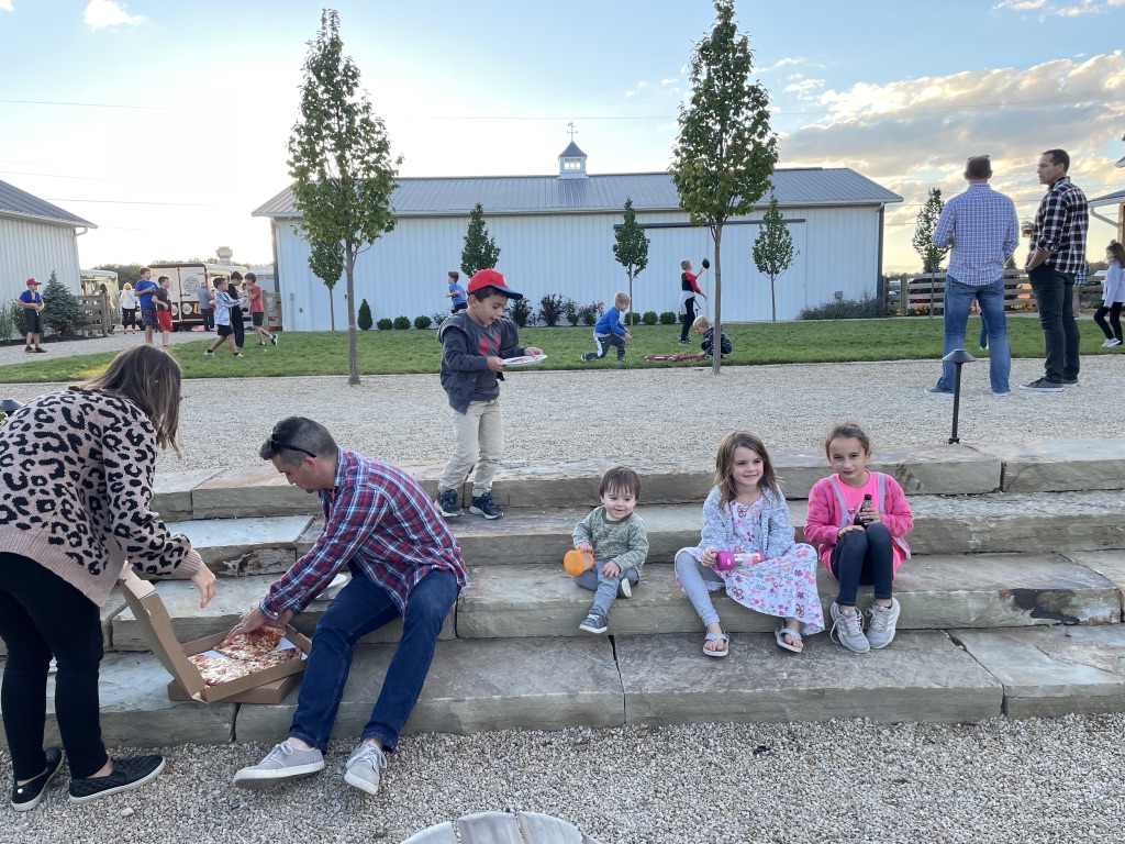 Kids and families enjoying the outside space at a brewery