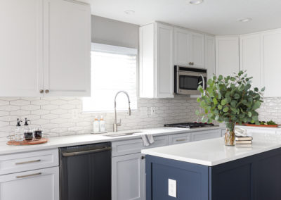 White Cabinetry Kitchen Remodel with Blue Island, unique tiles and coffee tray
