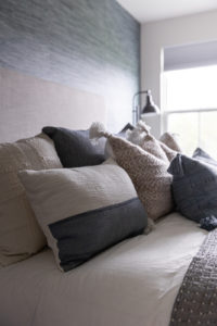 Decorative pillows on bed