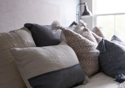 Decorative pillows on bed
